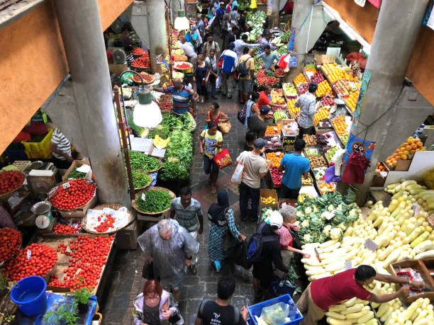 Colourful stalls selling tropical fruits at the Port Louis Central Market
